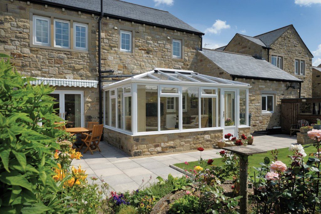 Ultraframe glass roof conservatory installation in Street